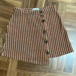 Urban outfitters s button skirt with asymmetric hem